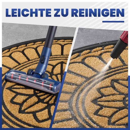 Leichte Reinigung: Halbrunde beige Fußmatte wird mit Staubsauger und Hochdruckreiniger gesäubert.