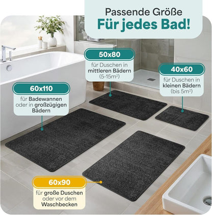 Verschiedene Groessen schwarzer Badematten im Badezimmer gezeigt, passend fuer Dusche, Wanne und kleine bis grosse Raeume zur optimalen Badgestaltung