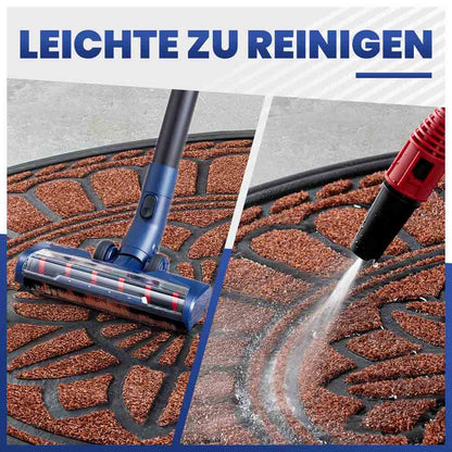Leichte Reinigung: Halbrunde braune Fußmatte wird mit Staubsauger und Hochdruckreiniger gesäubert.