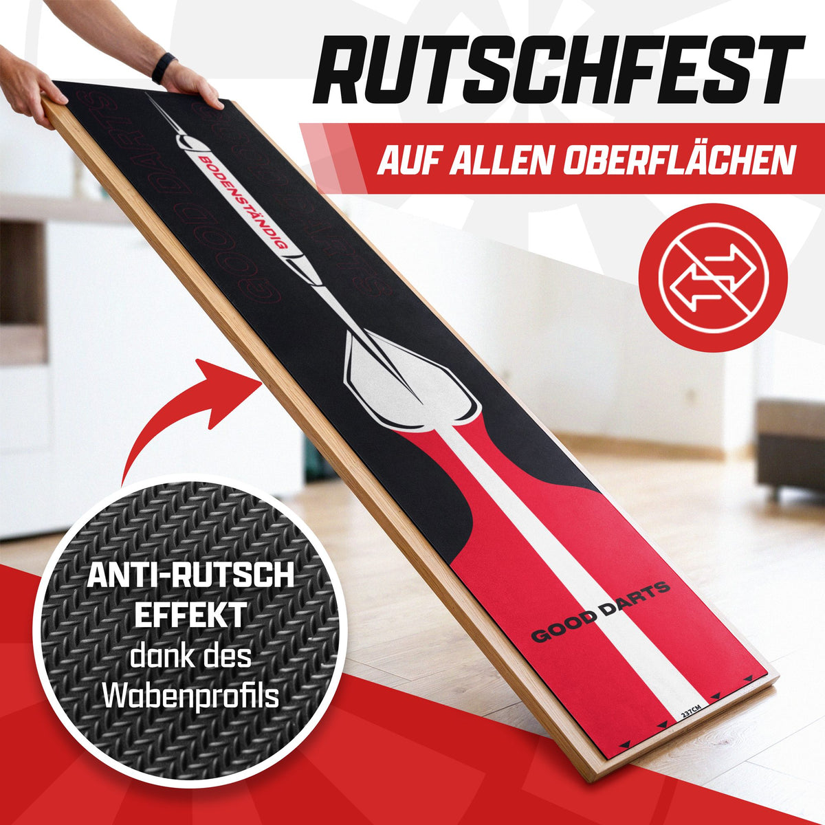 Schwarz-roter Dartteppich mit Dartpfeil lehnt schräg an einer Holzplatte, Text: rutschfest auf allen Oberflächen