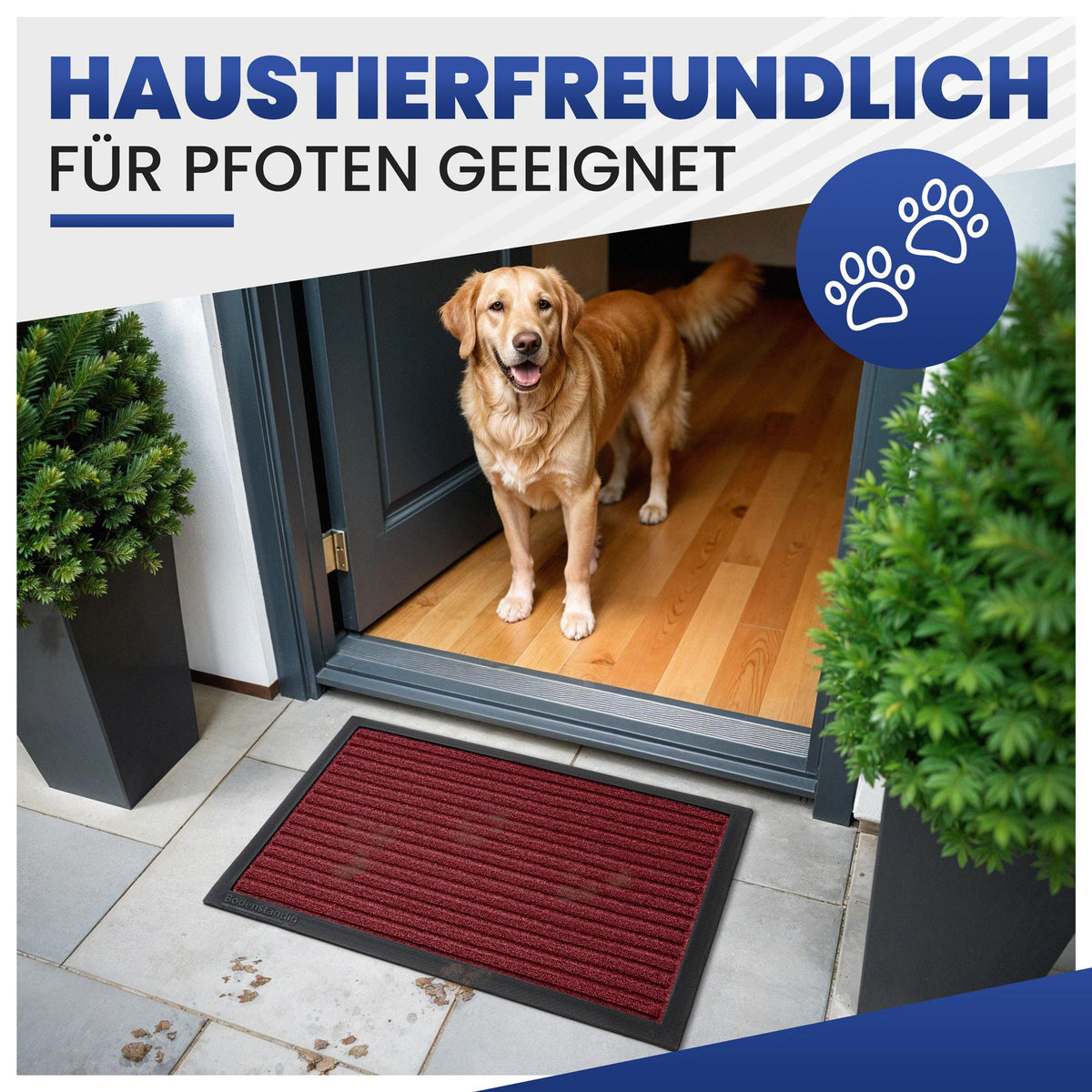 Dunkelrote Fußmatte vor einer Haustür, dahinter steht ein Golden Retriever; Text: haustierfreundlich, für Pfoten geeignet