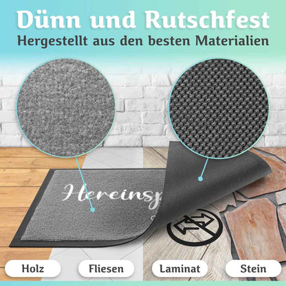 graue fussmatte mit rutschfester unterseite und detailaufnahme der materialstruktur geeignet fuer holz fliesen laminat und steinboeden