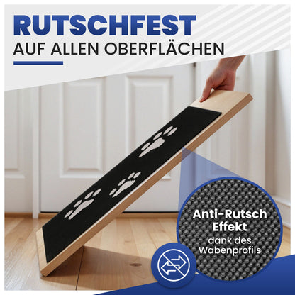 Schwarze Fußmatte mit weißen Pfoten auf schräger Platte, Wabenprofil im Detail, Text Rutschfest auf allen Oberflächen