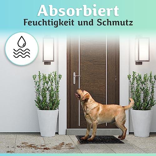 Die schwarze Fußmatte absorbiert Feuchtigkeit und Schmutz und hält den Eingangsbereich auch bei nassen Pfoten zuverlässig sauber.
