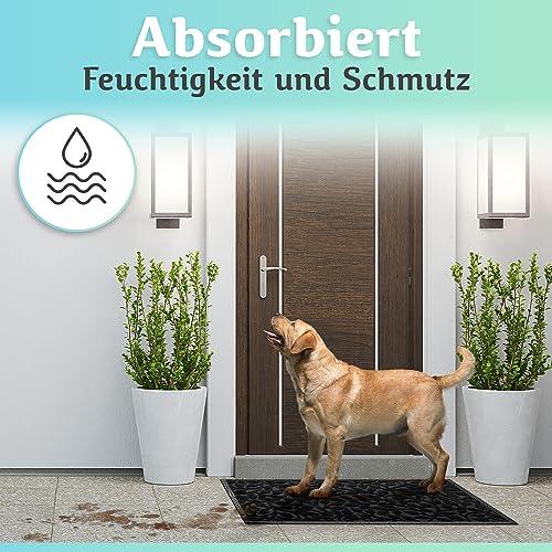 Die schwarze Fußmatte absorbiert Feuchtigkeit und Schmutz und hält den Eingangsbereich auch bei nassen Pfoten zuverlässig sauber.
