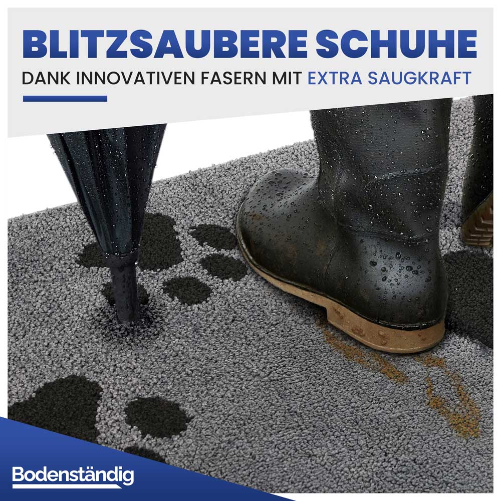 Blitzsaubere Schuhe: Gummistiefel auf der extra saugstarken grauen Schmutzfangmatte.