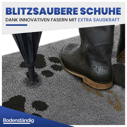 Blitzsaubere Schuhe: Gummistiefel auf der extra saugstarken grauen Schmutzfangmatte.