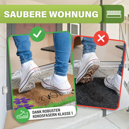 Kokosmatte „Willkommen“ mit lila Blumen: Weiße Turnschuhe bleiben sauber, auf schwarzer Matte sind die Sohlen schmutzig
