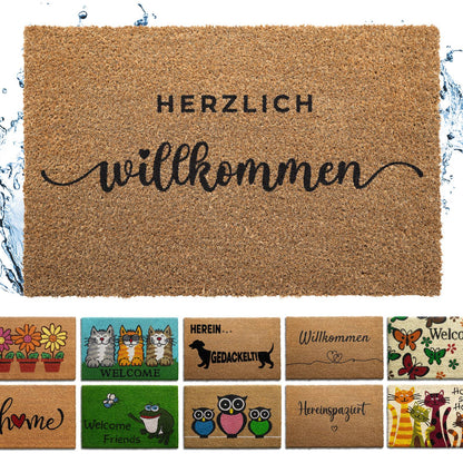 Kokos Fußmatte mit Schriftzug „Herzlich willkommen“, darunter Auswahl weiterer Motive, Wasser spritzt