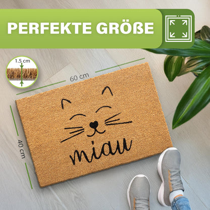 Kokos Fußmatte mit Katzengesicht und miau, Maße 40 x 60 cm, Florhöhe 1,5 cm, daneben Füße in Sneakern