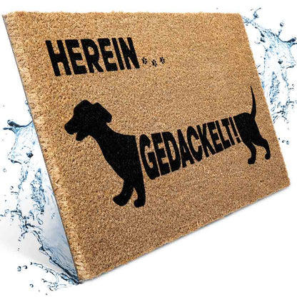 kokos fussmatte herein gedackelt mit hund motiv wasser splash effekt robuste naturfasern fuer eingangsbereich drinnen und draussen langlebig
