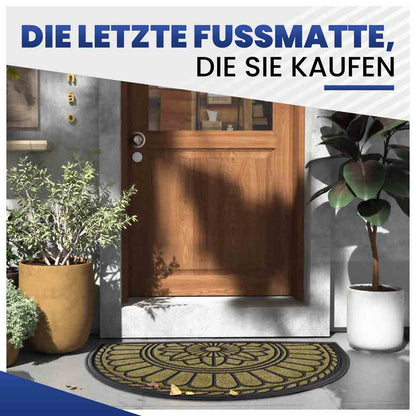 Langlebige, halbrunde Türmatte mit Blumenmuster in Beige vor einer braunen Holztür und dekorativen Pflanzen.