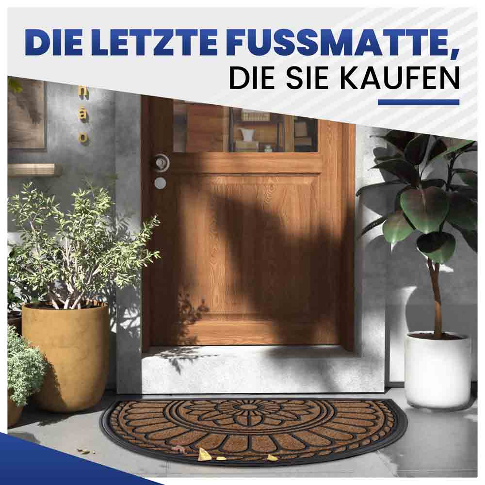 Langlebige Tuermatte mit Blumenmuster in Braun vor einer modernen Holztür und dekorativen Pflanzen.