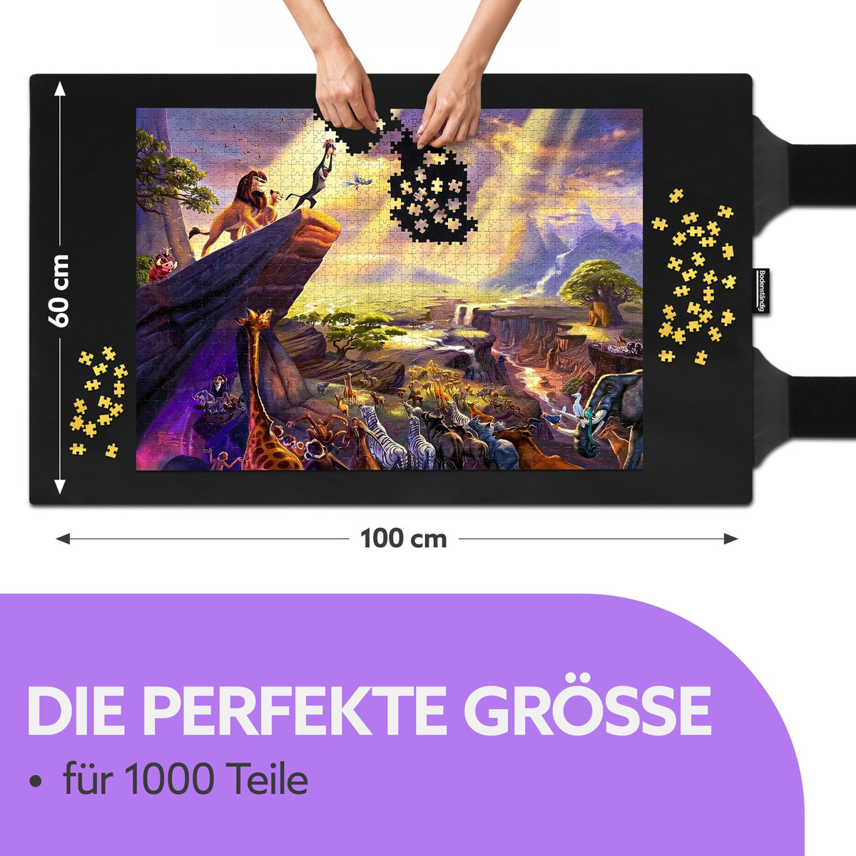 Schwarze Puzzlematte, 60 x 100 cm, mit fast fertigem 1000-Teile-Puzzle, Händen und losen gelben Puzzleteilen