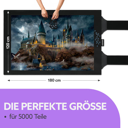 Schwarze Puzzlematte 120 x 180 cm mit Schloss-Puzzle bei Nacht, Text: Die perfekte Größe für 5000 Teile