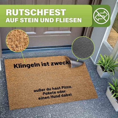 rutschfeste kokos fussmatte mit text vor haustur zeigt grip auf stein und fliesen dank robuster fasern und rutschhemmender unterseite