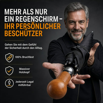 Lächelnder Mann hält schwarzen Regenschirm mit Holzknauf; Text: Mehr als nur ein Regenschirm, bruchfest, legal mitführbar