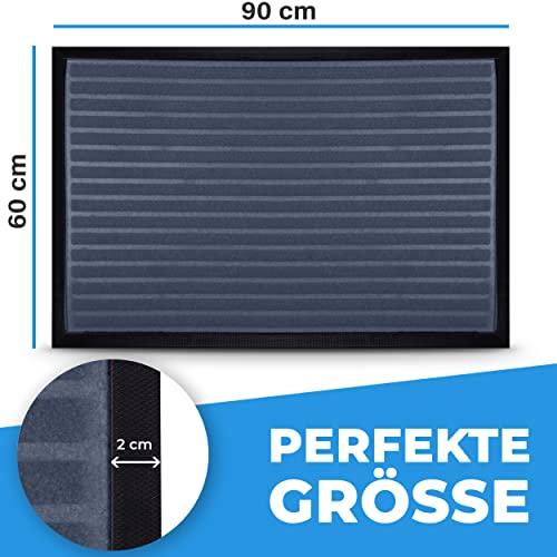 Graue Fussmatte 90x60 cm mit streifenstruktur und 2-cm Randdetail, ideal fuer grosse Eingangsbereiche.
