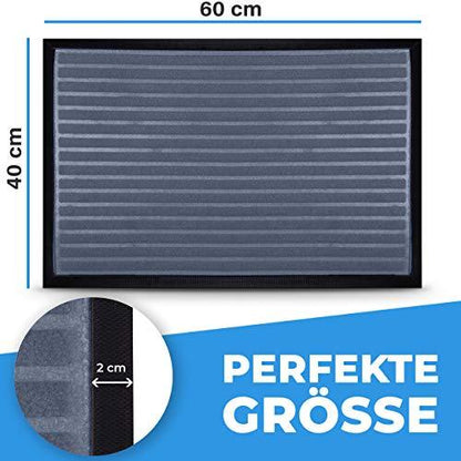 Graue Fussmatte 60x40 cm mit streifenstruktur und 2-cm Randdetail, perfekt fuer kleine Eingangsbereiche.